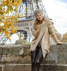 happy elegant woman having walking tour in Paris, France