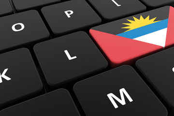 Computer keyboard, close-up button of the flag of Antigua and Barbuda. 3D render of a laptop keyboard