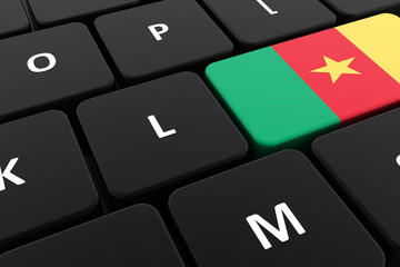 Computer keyboard, close-up button of the flag of Cameroon. 3D render of a laptop keyboard