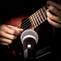 Sticker - musician hands playing & recording acoustic guitar