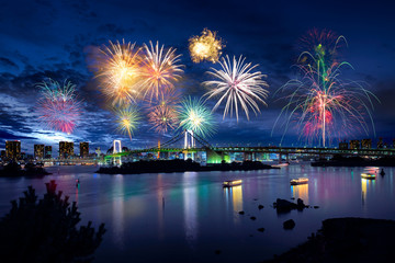 tokyo bay city view and tokyo rainbow bridge with beautiful fireworks