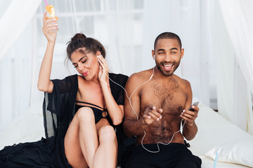 Poster - Young happy couple in love having fun at the beach