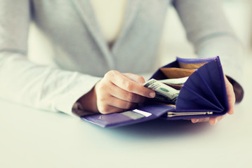 Poster - close up of woman hands with wallet and money