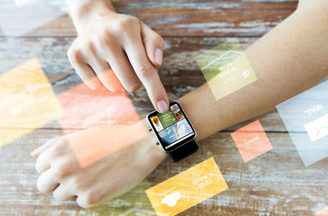 Sticker - close up of female hands with news on smart watch