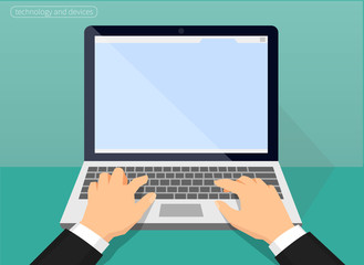 laptop and hands on the keyboard