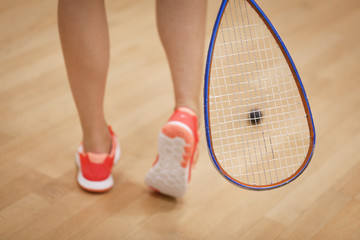 woman with squash racket 