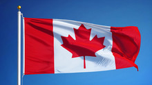 Canada Flag Waving Against Clean Blue Sky, Close Up, Isolated With Clipping Mask Alpha Channel Transparency, Perfect For Film, News, Digital Composition