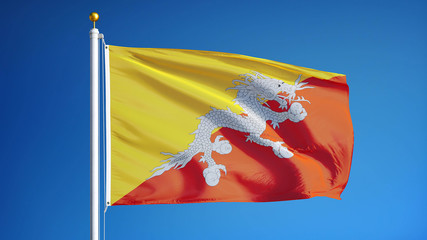 Bhutan flag waving against clean blue sky, close up, isolated with clipping mask alpha channel transparency, perfect for film, news, digital composition