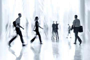 group of people in the lobby business center and blue tonality