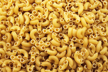 A Close Up Image Of Elbow Macaroni Noodles