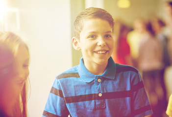 Poster - group of smiling school kids in corridor