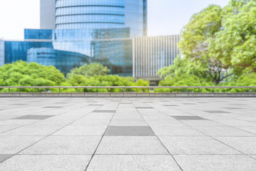 empty pavement front of modern office buildings