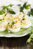Fototapeta Tulipany - Stuffed eggs with shrimps and curry