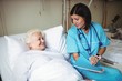 © Wavebreak Media - Nurse interacting with patient in hospital
