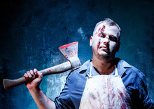 Bloody Halloween Theme: Crazy Killer As Butcher With An Ax