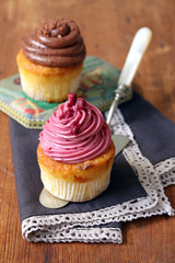 tea party with chocolate and raspberry cupcakes