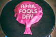 Whoopie Cushion April Fools Day. Whoopie cushion on a chair with the words April Fools Day printed on it.
