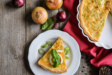 Wall Mural - Onion Quiche with Camembert, leek and eggs