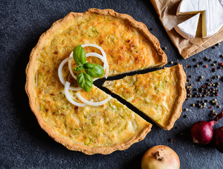 Wall Mural - Onion Quiche with Camembert, leek and eggs