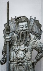 Chinese  Stone  doll in Wat Pho Bangkok Thailand.