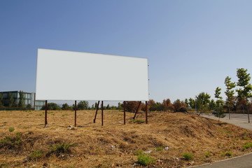 Wall Mural - Blank billboard in a plot