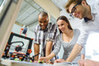 © Yakobchuk Olena - Joyful creative team working with three dimensional technology