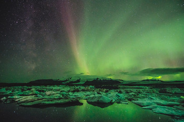 northern lights over the ice lagoon, iceland