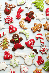 Wall Mural - Christmas cookies on a blue wooden table