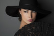 © Kassandra - woman with black hat