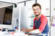 © Sergey Nivens - Young man working in office