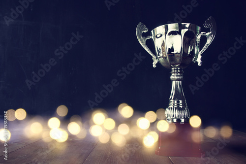 Cuadros en Lienzo low key image of trophy over wooden table