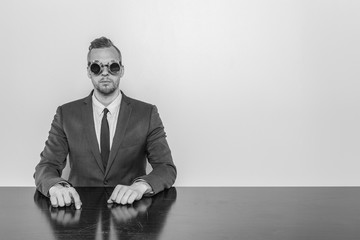 Wall Mural - Businessman sitting at office desk