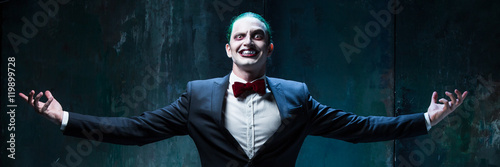 Bloody Halloween theme: crazy joker face Wallpaper Mural