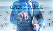 © WrightStudio - Businessman is pressing button on touch screen interface and selecting 'Open source'.