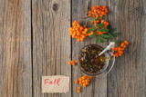 Fototapeta Sawanna - Herbal tea on rustic wooden table