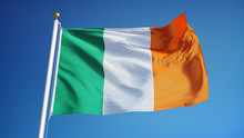 Ireland Flag Waving Against Clean Blue Sky, Close Up, Isolated With Clipping Path Mask Alpha Channel Transparency
