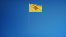 New Mexico Flag Waving Against Clean Blue Sky, Long Shot, Isolated With Clipping Path Mask Alpha Channel Transparency