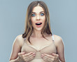 Surprising woman portrait with breast in bra