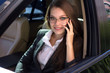 © antoshina_t - Woman sits in the car speaks by phone
