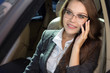 © antoshina_t - Woman sits in the car speaks by phone