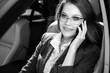 © antoshina_t - Woman sits in the car speaks by phone