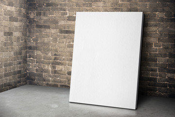 Leinwandbilder - Blank white canvas frame leaning at grunge brick wall and wood f