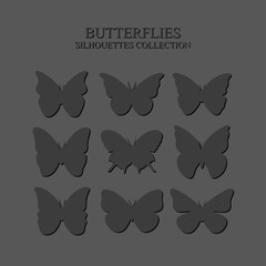 Wall Mural - gray silhouettes of butterflies on a gray background