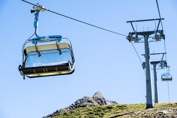 Canvas Print - ski lift chairs