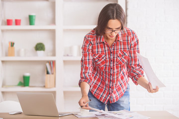 Canvas Print - Pretty female doing paperwork