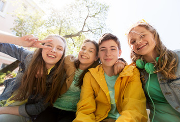 Canvas Print - happy teenage students or friends having fun