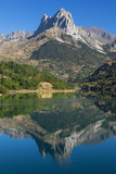 Fototapeta Góry - Penya Foratata reflected in the Lanuza reservoir