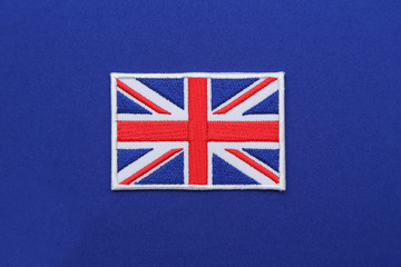 uk flag patch on blue fabric