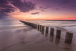 Wooden breakwater - Baltic seascape at sunset, Poland