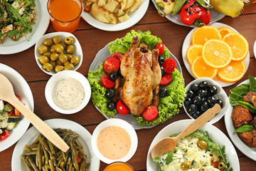 Poster - Plates with different salads and meat on table